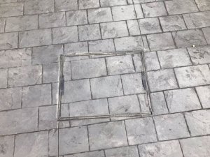 New concrete driveway in Basalt Grey and printed in large London Cobble
