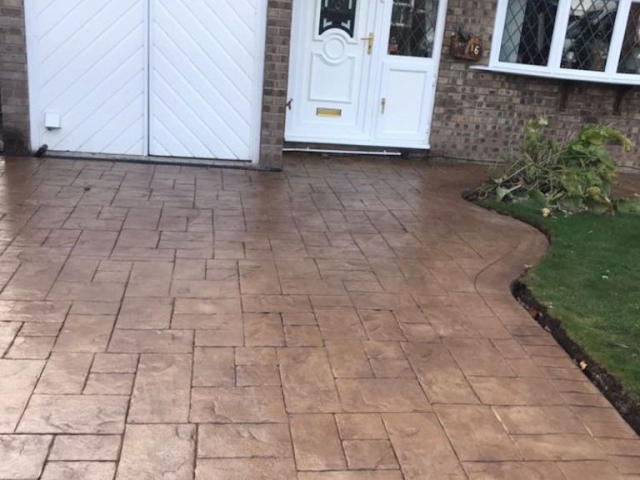 Concrete Printed Driveway in Bideford buff with walnut release printed in Ashlar cut stone