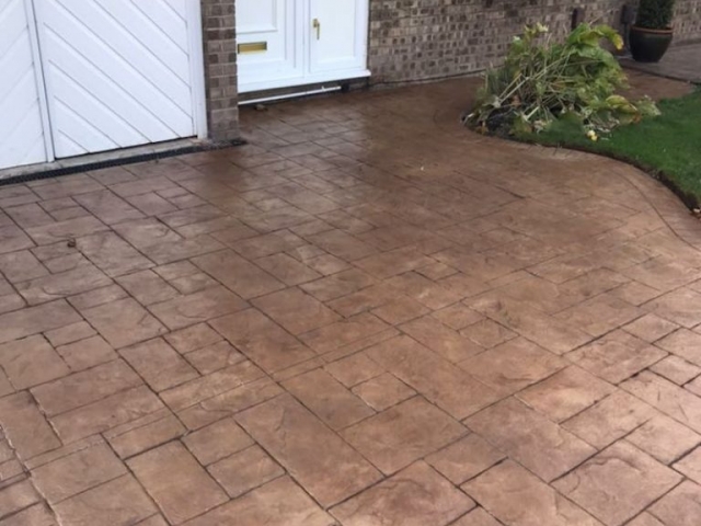 Concrete Printed Driveway in Bideford buff with walnut release printed in Ashlar cut stone