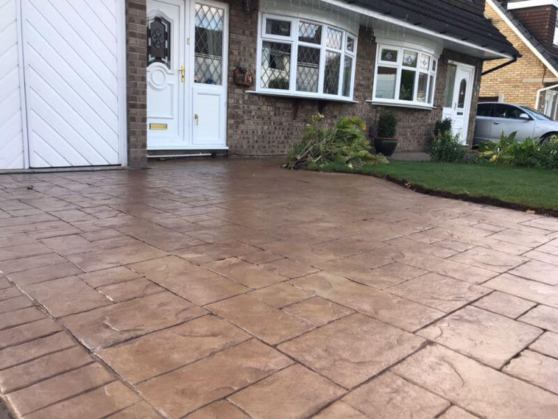 Concrete Printed Driveway in Bideford buff with walnut release printed in Ashlar cut stone