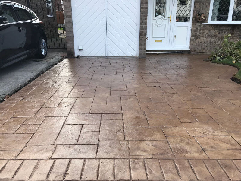 Concrete Printed Driveway in Bideford buff with walnut release printed in Ashlar cut stone