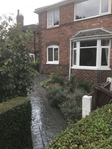 A pattern imprinted concrete patio and paths in the Burnage area of Manchester