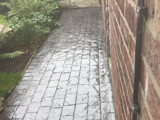 A pattern imprinted concrete patio and paths in the Burnage area of Manchester