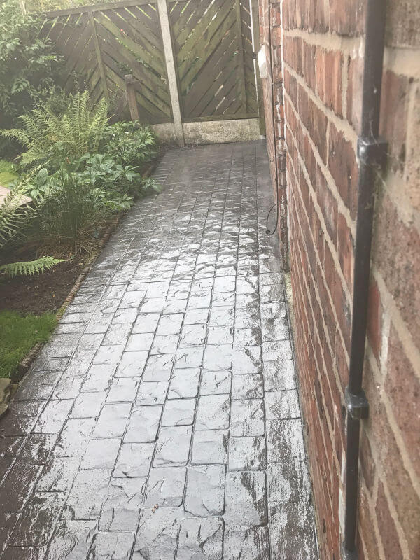 A pattern imprinted concrete patio and paths in the Burnage area of Manchester