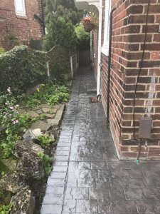A pattern imprinted concrete patio and paths in the Burnage area of Manchester