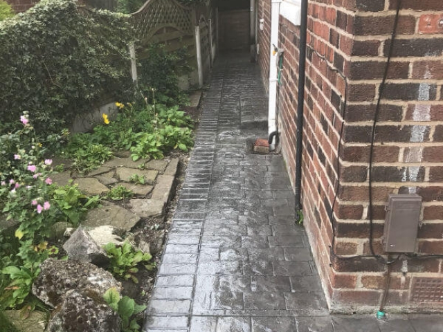 A pattern imprinted concrete patio and paths in the Burnage area of Manchester