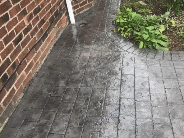 A pattern imprinted concrete patio and paths in the Burnage area of Manchester