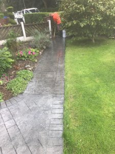 A pattern imprinted concrete patio and paths in the Burnage area of Manchester