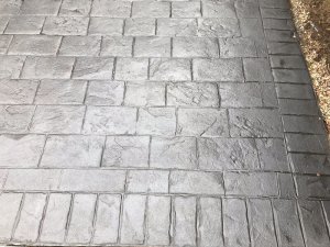 New pattern imprinted concrete driveway