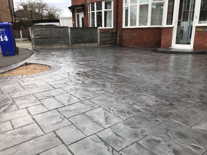 New concrete driveway in platinum grey colour