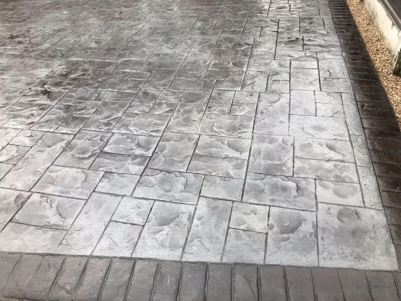 New concrete driveway in platinum grey colour