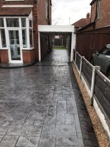 New concrete driveway in platinum grey colour