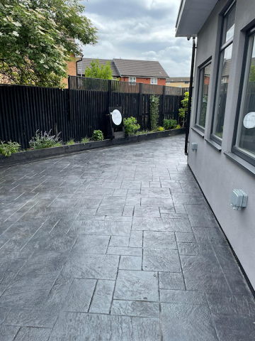 New pattern imprinted concrete patio in Moss Side, Manchester