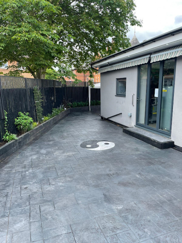 New pattern imprinted concrete patio in Moss Side, Manchester