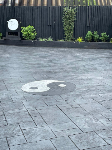 New pattern imprinted concrete patio in Moss Side, Manchester