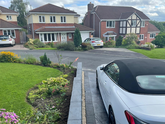 New pattern imprinted concrete driveway