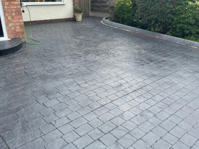 New pattern imprinted concrete driveway in Hale