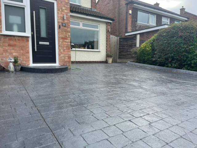 New pattern imprinted concrete driveway in Hale