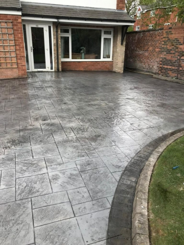 Pattern Imprinted Concrete Driveway by Planet Surfacing