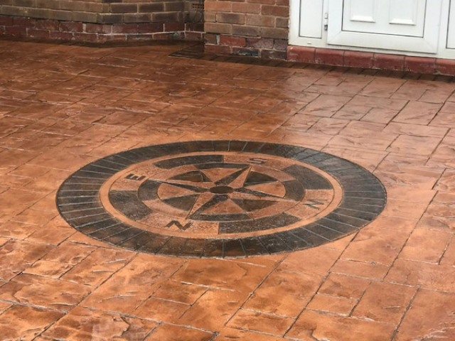 Compass Feature Included in a Pattern Imprinted Concrete Driveway in Sale, Manchester