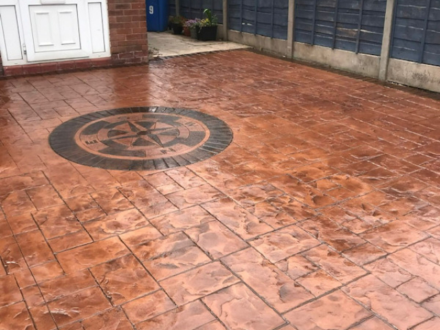 Compass Feature Included in a Pattern Imprinted Concrete Driveway in Sale, Manchester