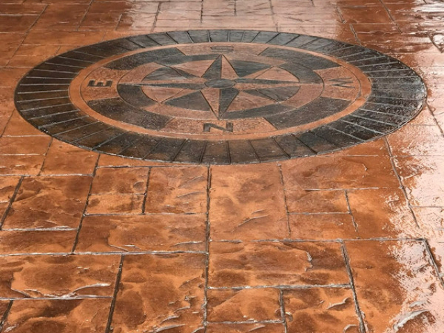 Compass Feature Included in a Pattern Imprinted Concrete Driveway in Sale, Manchester