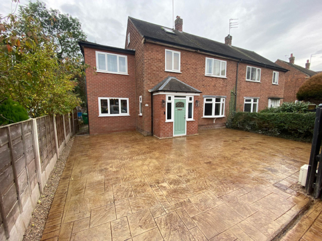 Pattern Imprinted Concrete Driveway in Didsbury by Planet Surfacing